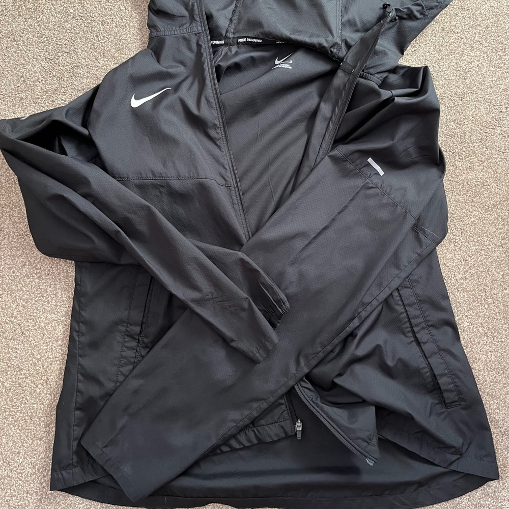 Nike windbreaker. no flaws just never wear it anymore.